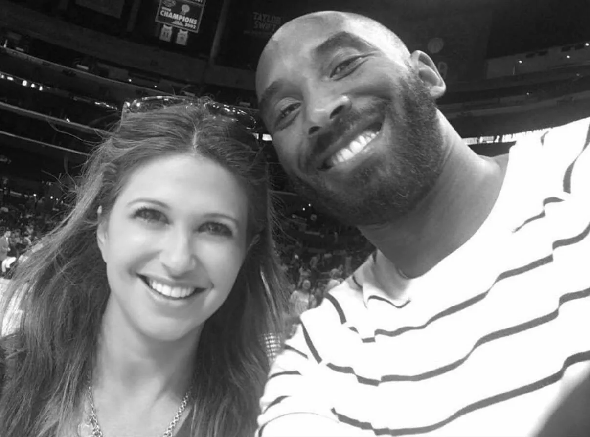 Rachel Nichols with Kobe Bryant, black-and-white photo at an NBA arena